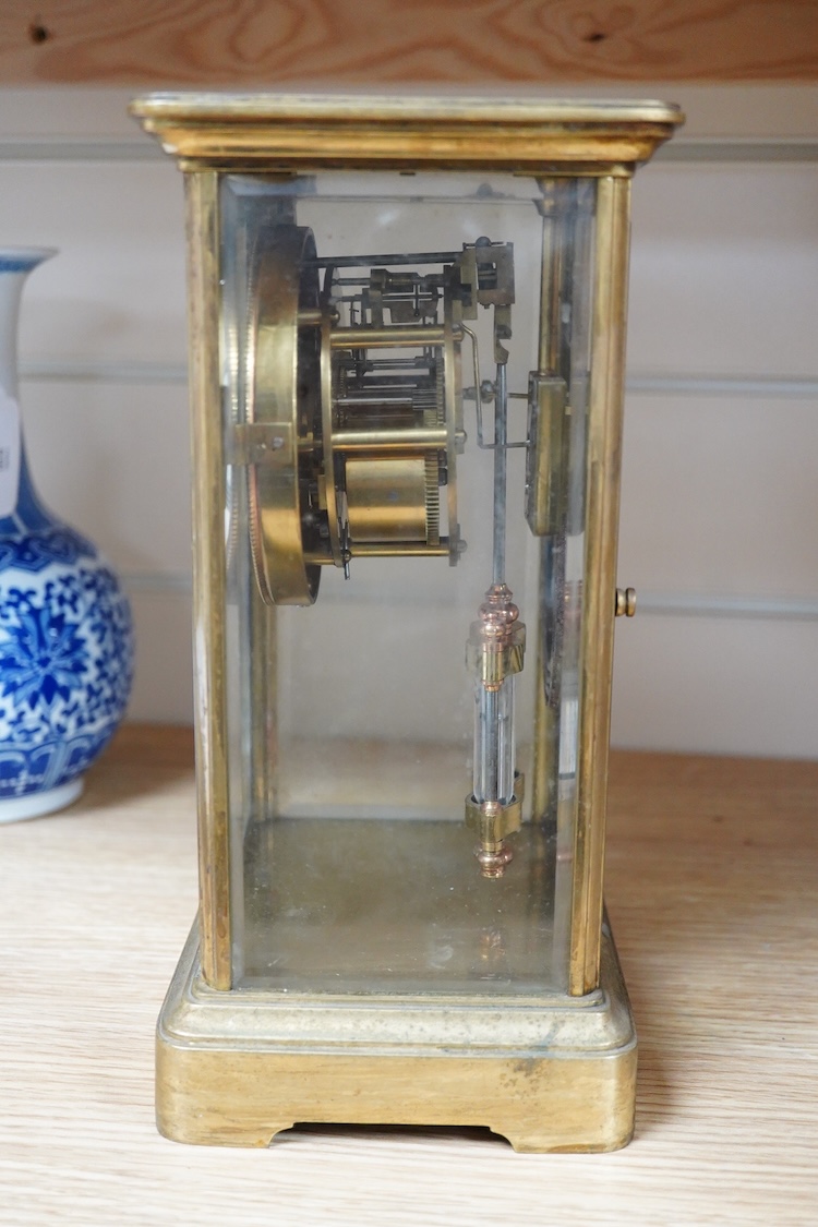 A late 19th century French brass four glass mantel clock, 25.5cm high
